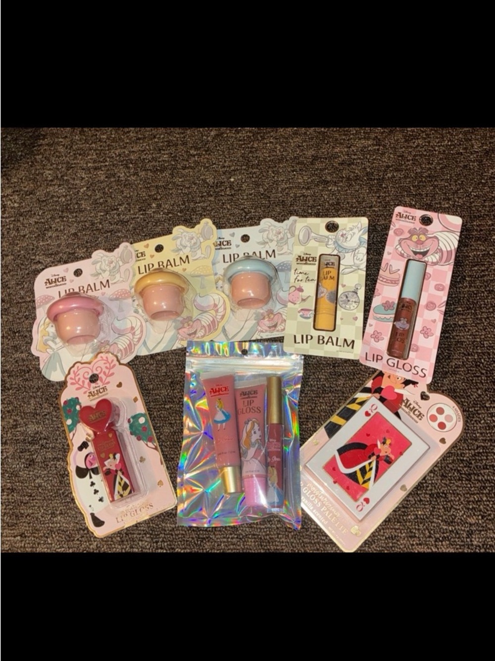 Alice in wonderland lippie bundle (12) tea pot lip balm (last pic)